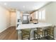 Kitchen features a breakfast bar, sleek countertops, and plenty of cabinet space at 10711 Silver Pond Ave, Las Vegas, NV 89135