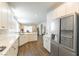 Modern kitchen featuring stainless steel appliances, sleek countertops, and ample cabinet space at 10711 Silver Pond Ave, Las Vegas, NV 89135