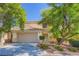 Charming two-story home with a well-maintained yard, two car garage and tiled roof at 10716 Aire Dr, Las Vegas, NV 89144