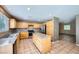Bright kitchen featuring granite countertops, stainless steel appliances and tile flooring at 10716 Aire Dr, Las Vegas, NV 89144