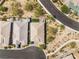 Aerial view displays the home's backyard, landscaping, community, and street layout at 10890 Red Yucca Dr, Las Vegas, NV 89138