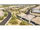 Aerial shot of home, showcasing landscaping, backyard patio, and community streets at 10890 Red Yucca Dr, Las Vegas, NV 89138