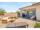 An inviting backyard offers an outdoor living space with lush landscaping at 10890 Red Yucca Dr, Las Vegas, NV 89138