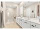 Contemporary bathroom with walk-in shower, modern vanity, and sleek fixtures at 10890 Red Yucca Dr, Las Vegas, NV 89138