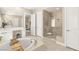 Elegant primary bathroom showcasing a soaking tub and a separate glass shower at 10890 Red Yucca Dr, Las Vegas, NV 89138