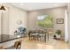 Bright dining area featuring a modern table set and a window view to the exterior at 10890 Red Yucca Dr, Las Vegas, NV 89138