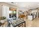 Open-concept space with dining area, kitchen, and living room flowing together seamlessly at 10890 Red Yucca Dr, Las Vegas, NV 89138