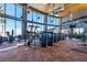 Well-equipped gym with modern exercise machines and floor-to-ceiling windows offering natural light at 10890 Red Yucca Dr, Las Vegas, NV 89138