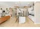 Open concept kitchen with large island, bar seating, stainless steel appliances, and open to the living area at 10890 Red Yucca Dr, Las Vegas, NV 89138