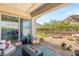 Inviting covered patio area featuring comfortable seating and mountain views at 10890 Red Yucca Dr, Las Vegas, NV 89138
