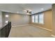 Loft area with neutral carpet, recessed lighting, and plantation shutters at 11063 Mount George St, Las Vegas, NV 89179