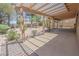 Covered patio overlooking the spacious backyard, ideal for outdoor entertaining at 1174 Monogram Way, Las Vegas, NV 89123