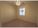Bedroom featuring tile flooring, a ceiling fan, and a window at 1174 Monogram Way, Las Vegas, NV 89123