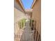 Front gate leading to the front door with mature bushes lining the walkway at 1174 Monogram Way, Las Vegas, NV 89123