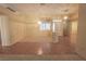 Bright living area with tile and carpet, featuring chandelier, and natural light at 1174 Monogram Way, Las Vegas, NV 89123