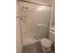 Shower featuring sliding glass doors, and tile surround at 1174 Monogram Way, Las Vegas, NV 89123