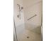Shower stall featuring marble style walls and tile floor at 1174 Monogram Way, Las Vegas, NV 89123
