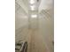 Walk-in closet featuring carpet floors and lots of metal shelving for organizing clothes and other items at 1174 Monogram Way, Las Vegas, NV 89123