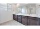 Bathroom with double sinks and large vanity at 11904 Glide Reflection Ave, Las Vegas, NV 89138