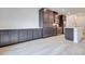Gourmet kitchen featuring an island with seating, stainless steel appliances, and stone countertops at 11904 Glide Reflection Ave, Las Vegas, NV 89138