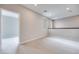 Upstairs loft area is carpeted with bright recessed lighting, and neutral paint at 11922 Glide Reflection Ave, Las Vegas, NV 89138