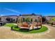 Inviting backyard with custom swing set, perfect for entertaining guests at 129 Major Bowling Pl, Henderson, NV 89011
