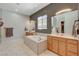 Spacious main bathroom showcasing a large soaking tub, double sink vanity, and neutral decor at 129 Major Bowling Pl, Henderson, NV 89011