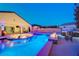 Luxurious backyard pool, spa, fire feature and covered patio for ultimate relaxation and entertainment at 129 Major Bowling Pl, Henderson, NV 89011