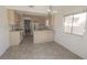 Eat-in kitchen with ample counter space, tile floors and modern appliances at 1349 Goldenglow Rd, Las Vegas, NV 89108