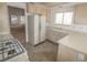 View of kitchen with ample counter space, tile floors and modern appliances at 1349 Goldenglow Rd, Las Vegas, NV 89108