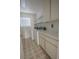 The laundry room has built-in cabinets, shelving, and two washing machines at 1349 Goldenglow Rd, Las Vegas, NV 89108