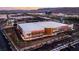 Aerial shot showcases commercial building with nearby stadium in vibrant urban environment at 1485 Melodic Lark Ln, Las Vegas, NV 89138