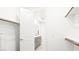 This walk-in closet leads into the bathroom with a double sink vanity at 1485 Melodic Lark Ln, Las Vegas, NV 89138