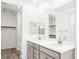 This bathroom features a double sink vanity with a large mirror and plenty of lighting at 1485 Melodic Lark Ln, Las Vegas, NV 89138
