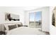 Bright bedroom with a walkout balcony and modern decor at 1485 Melodic Lark Ln, Las Vegas, NV 89138