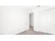 Bright bedroom featuring neutral walls, carpet, and a closet for ample storage at 1485 Melodic Lark Ln, Las Vegas, NV 89138