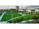 Expansive green lawn area with walking paths and manicured trees in a commercial space at 1485 Melodic Lark Ln, Las Vegas, NV 89138