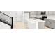 Beautiful modern kitchen with an island and quartz countertops at 1485 Melodic Lark Ln, Las Vegas, NV 89138