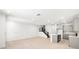 An open floor plan with an open living space next to the staircase at 1485 Melodic Lark Ln, Las Vegas, NV 89138