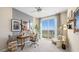 Bright home office featuring a desk, chair, and large windows with scenic views at 1485 Melodic Lark Ln, Las Vegas, NV 89138