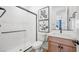 Clean bathroom featuring a tiled shower, modern vanity, and neutral color scheme at 1491 Melodic Lark Dr, Las Vegas, NV 89138