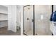 Modern bathroom features a glass enclosed shower with tiled walls and floors at 1491 Melodic Lark Dr, Las Vegas, NV 89138