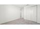 Carpeted bedroom with a closet and lots of wall space at 1491 Melodic Lark Dr, Las Vegas, NV 89138