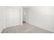 Carpeted bedroom featuring base trim and a closet with sliding doors at 1491 Melodic Lark Dr, Las Vegas, NV 89138
