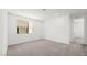 Bright, spacious carpeted bedroom with a window and lots of wall space at 1491 Melodic Lark Dr, Las Vegas, NV 89138