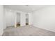 Carpeted bedroom with dual entryways leading to a bathroom and closet at 1491 Melodic Lark Dr, Las Vegas, NV 89138