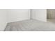 This bedroom features plush carpet, neutral walls, and an en-suite bathroom at 1491 Melodic Lark Dr, Las Vegas, NV 89138