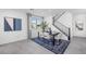 Modern dining room with sleek furniture, neutral decor, and ample natural light at 1491 Melodic Lark Dr, Las Vegas, NV 89138