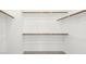 This closet features custom wood shelving for ample storage at 1491 Melodic Lark Dr, Las Vegas, NV 89138