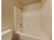 Cozy bathroom featuring a standard tub-shower combination and simple fixtures at 2132 Tierra Del Verde St, Las Vegas, NV 89156